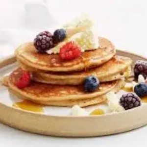 3‑Stack-Berry-Banana-Pancakes-image-harvestermenuuk.com